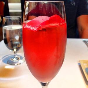 Pamarosa: sparkling wine, pomegranate liquor and a rose petal
