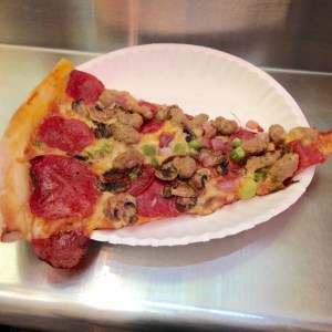 Location: Hole In The Wall in Marina District, SF A slice of "All Meat" pizza. Picture might not say much, but it sure made my tummy VERY happy at the moment!