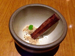 Dehydrated and roasted stick of, cauliflower and white chocolate mousse, cocoa nibs.