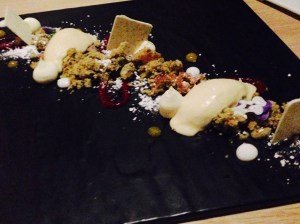 Winter Wonderland: pistachio cake, spicy berry sauce, white chocolate cremosso, chocolate powder, madarin gel, coconut snow, coquito ice cream.